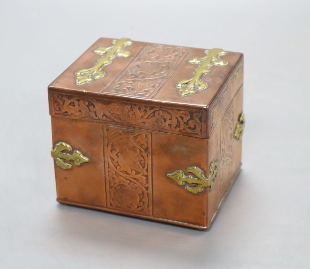 A copper brass mounted miniature casket, width 10cm height 9cm